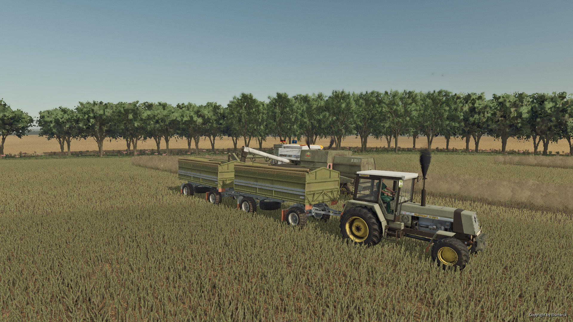 wir sehen ein E516b im raps zu abfahren 2hw80 mit zugtraktor 423A