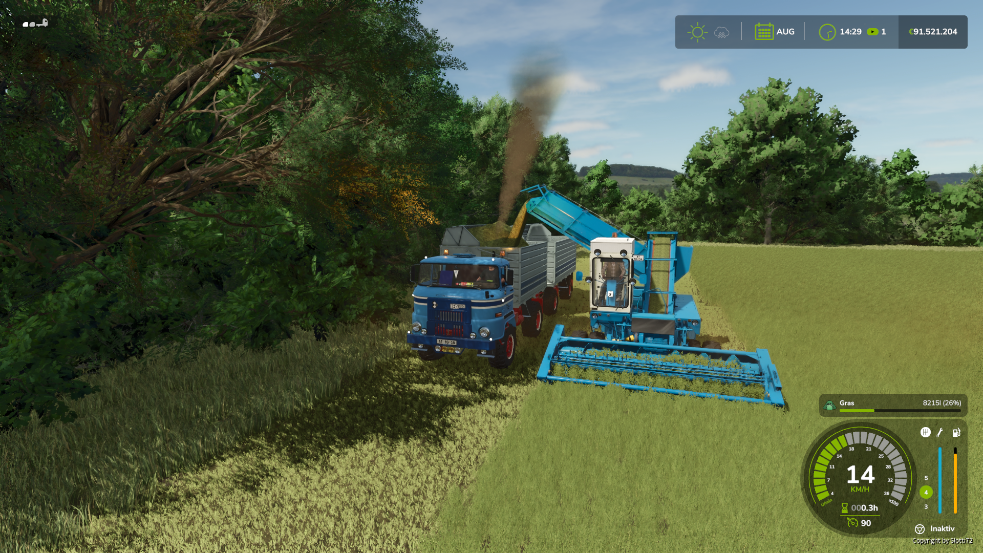 Gras für die Kühe mähen