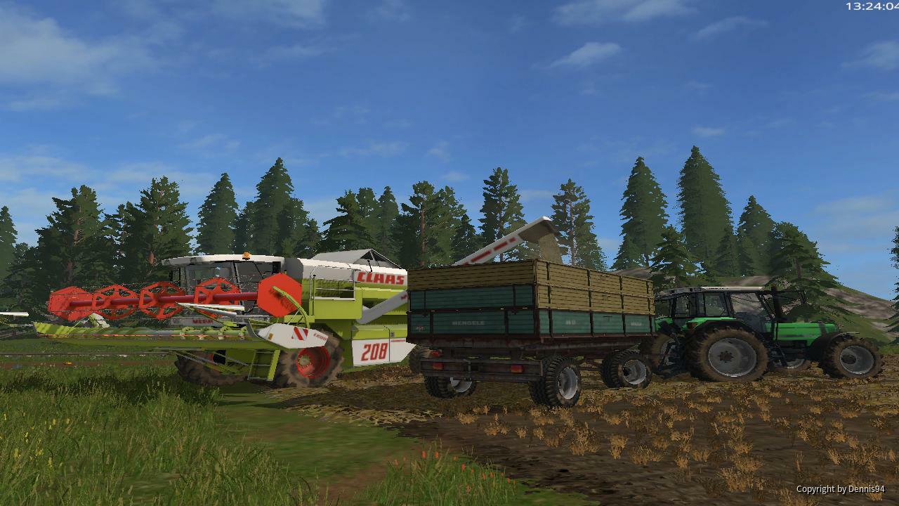 Claas am abbunkern auf Anhänger mit Deutz agrostar dx 6.31