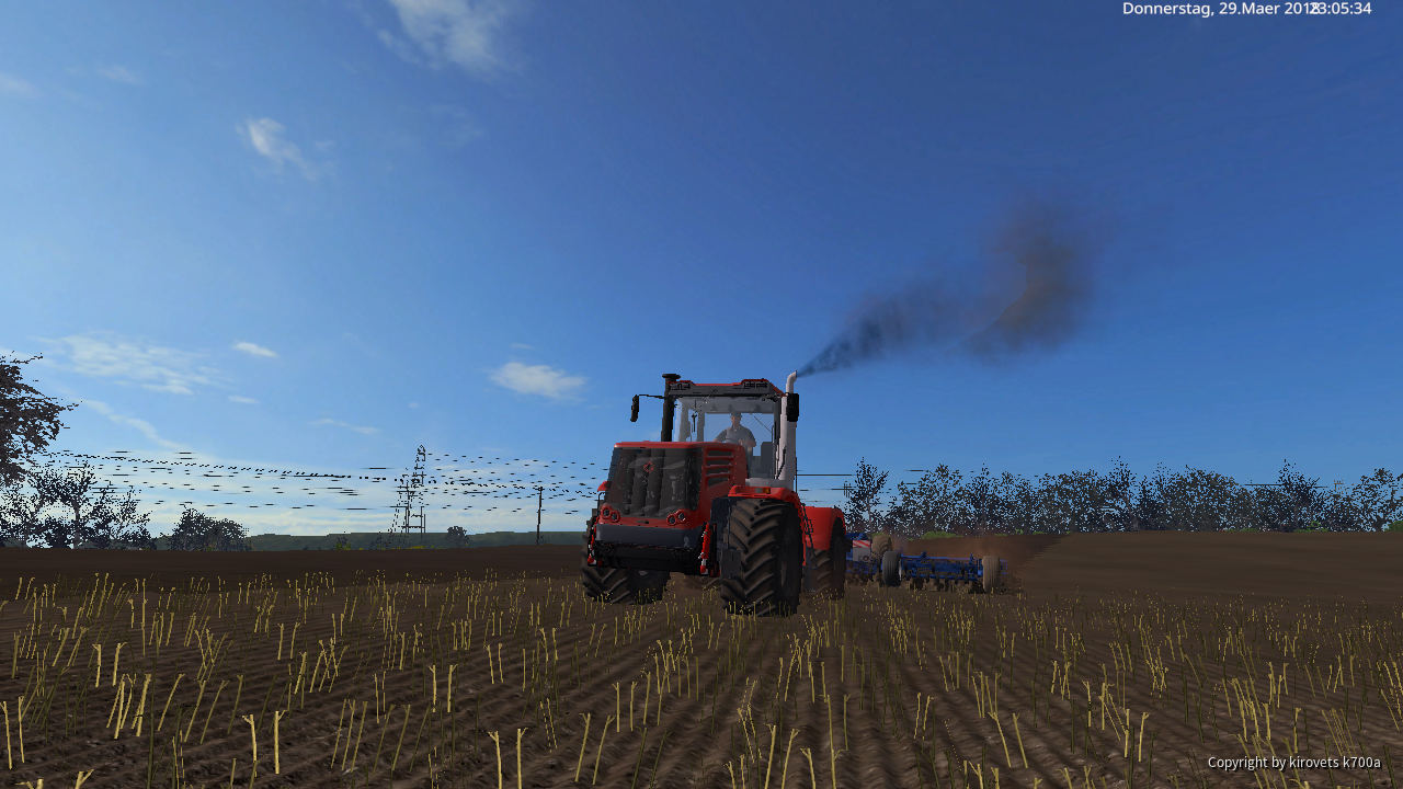 Kirovets K744 R4 bei der Bodenbearbeitung