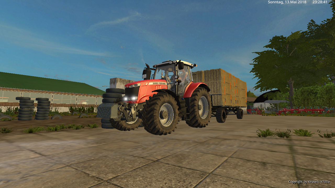 Massey Ferguson 7722 beim Stroh fahren