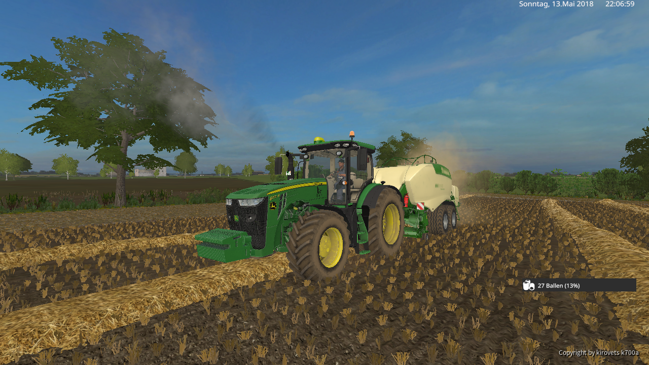John Deere 8270 am Ballen pressen