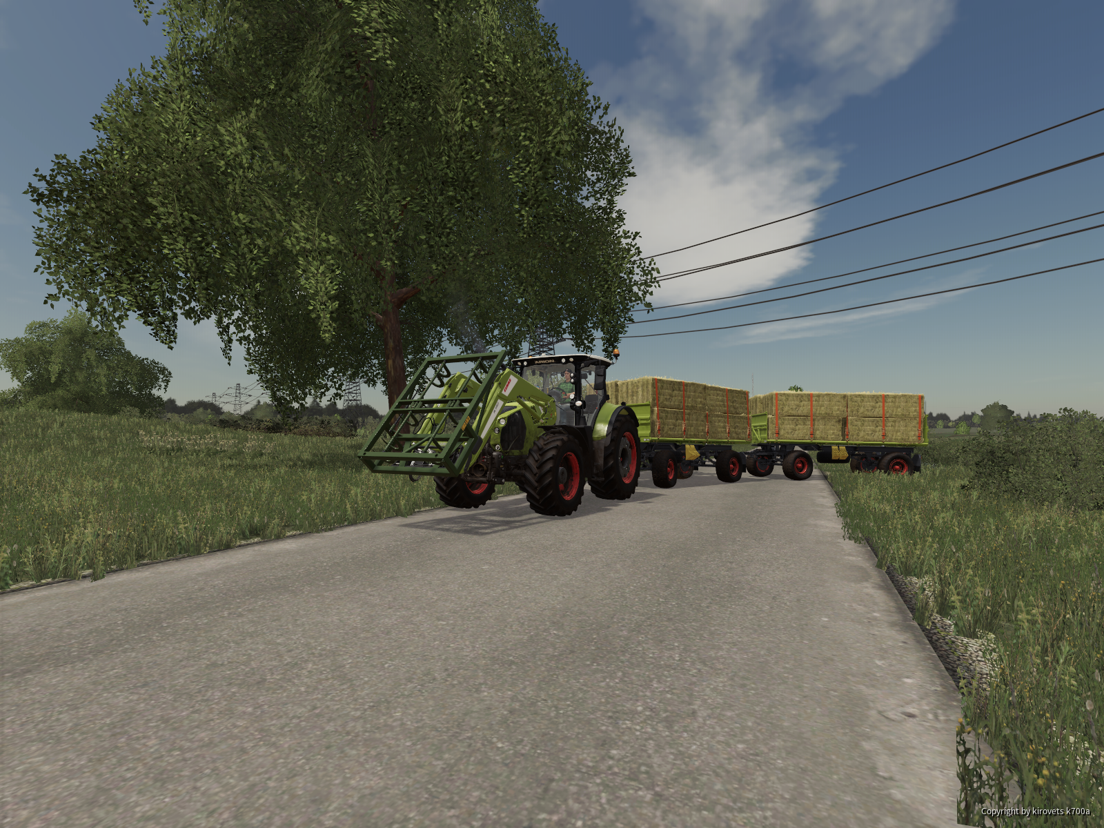 Claas Arion am Ballen fahren und stappeln
