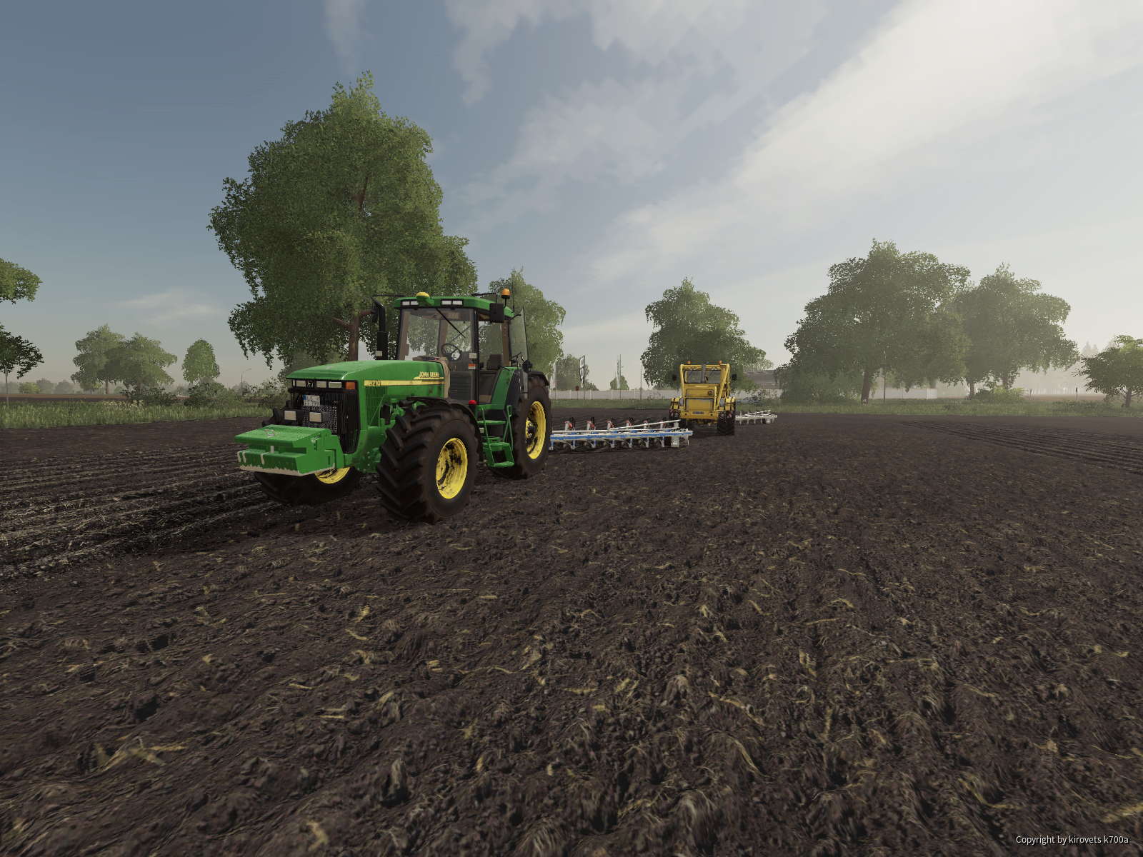 John Deere 8210 und Kirovets K700A am Pflügen