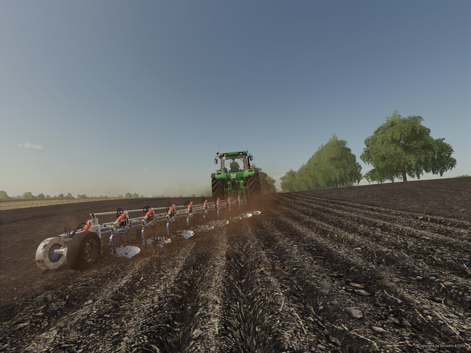 John Deere 8210 und Kirovets K700A am Pflügen