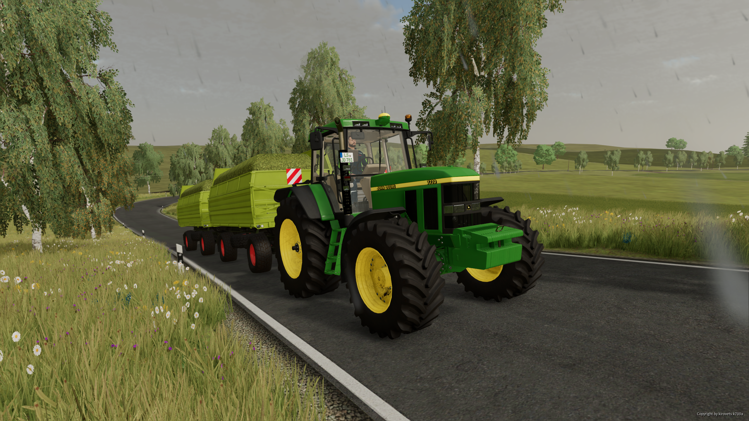 Der Dicke John Deere 7710 beim Häckselmais fahren